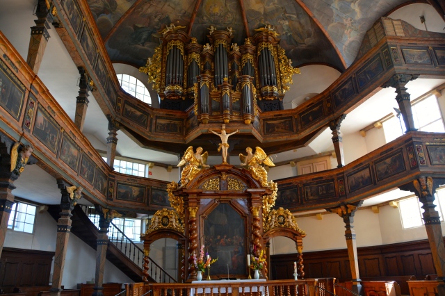 Trinity Lutheran Church, Speyer, Germany. Note the unusual placement of the organ, above the altar. ©Jean Janssen
